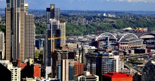 Mount Rainer beyond Seattle skyline. Photo ID 54948466 © Emilysfolio | Dreamstime.com